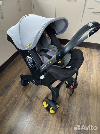 Коляска автокресло doona с базой isofix