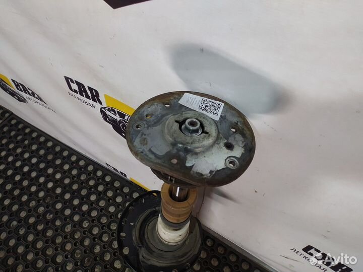 Стойка амортизатора передняя левая L