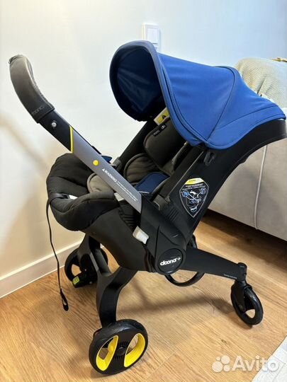 Коляска автокресло doona+ с базой isofix