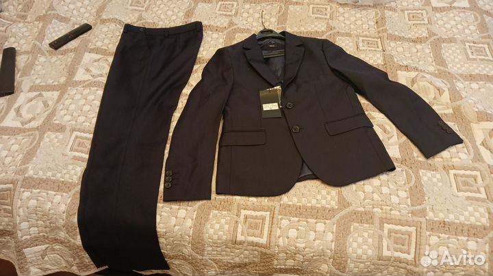 Костюм для мальчика школьный,тройка,134