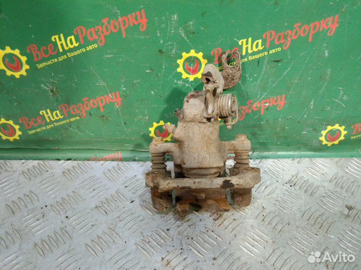 Суппорт задний левый Hyundai Lantra универсал