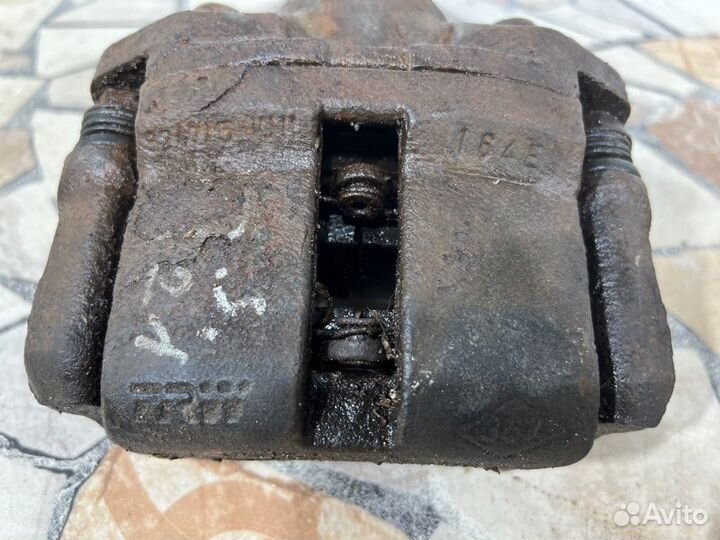 Суппорт тормозной Renault Symbol седан 1.4