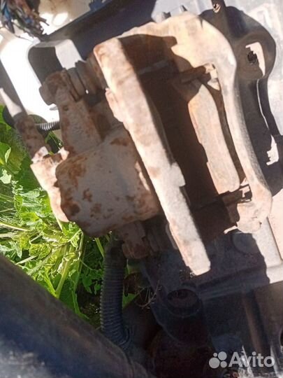 Суппорт тормозной передний Opel Corsa D