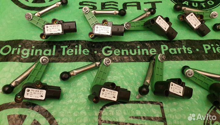 Датчик уровня кузова 7p0616571 VAG Оригинал Новый