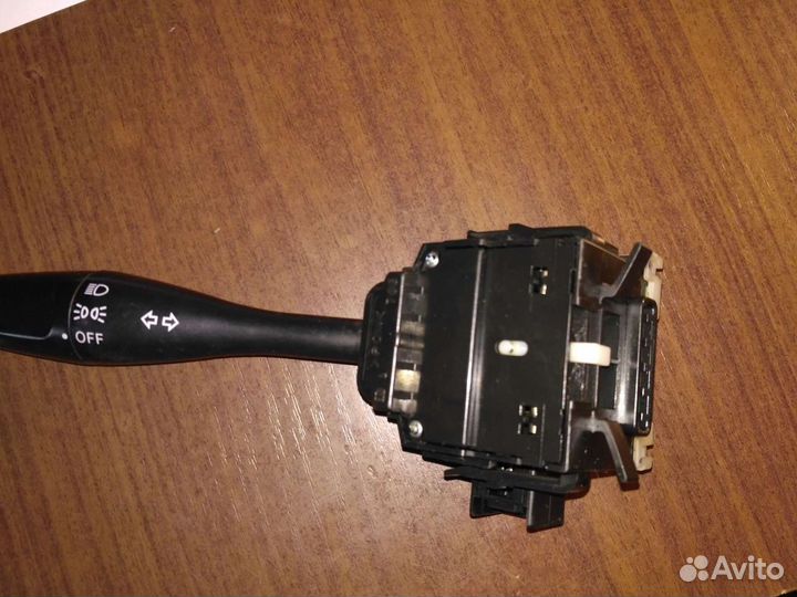 Под рулевой переключатель света Лансер 9