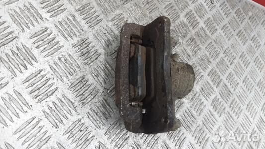 Суппорт тормозной задний левый KIA sorento 2 (XKR0