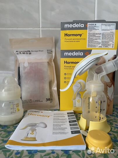 Молокоотсос medela ручной, бутылочка, пакета