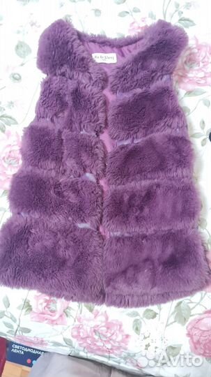 Меховая жилетка
