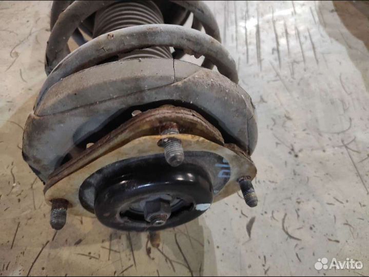 Стойка передняя левая в сборе Mazda 323 2001 рест