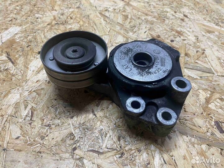 Натяжитель ремня генератора Volkswagen passat 7 (3