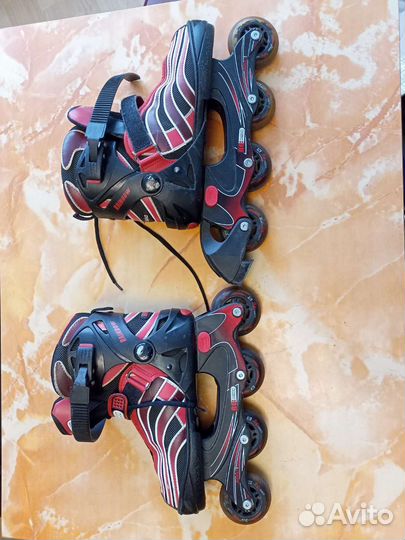 Роликовые коньки