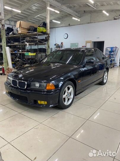 Замок двери передний левый Bmw 3 E36 sedan/ E36/2C