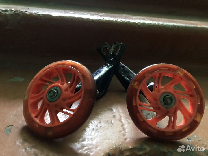 Дополнительные колеса для детского велика