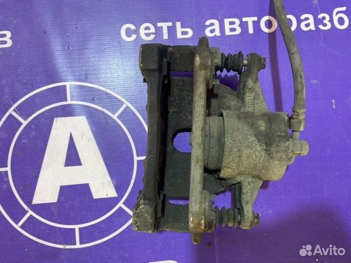 Суппорт передний левый Toyota Avensis Т25 1AZ-FSE