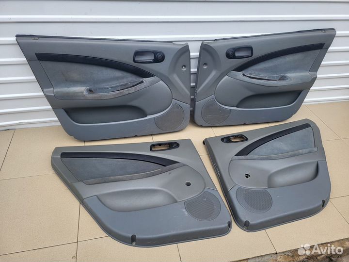 Обшивка двери комплект Chevrolet Лачетти