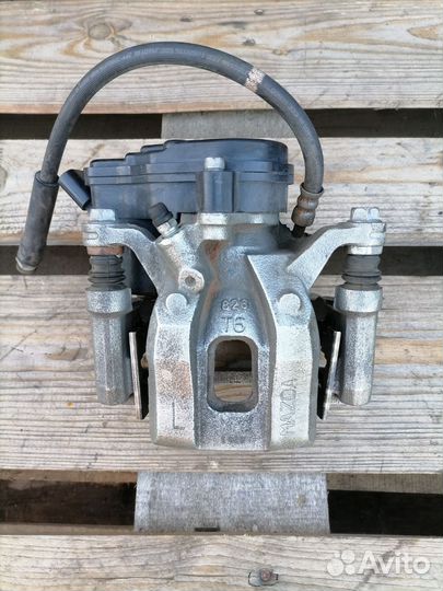 Задний левый тормозной суппорт Мазда CX-9