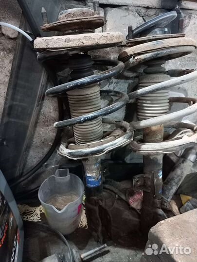 Передние стойки митсубиси аутлендер XL 3.0