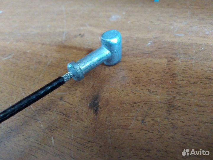 Трос стояночного тормоза задний левый Nissan