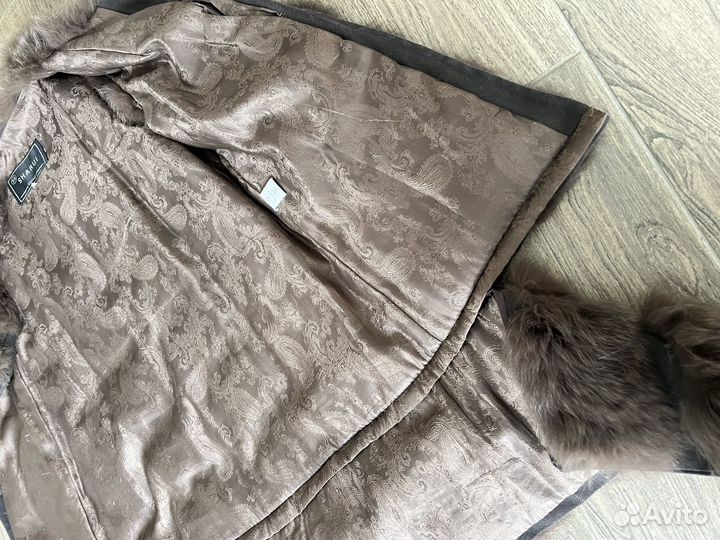 Жилетка меховая женская