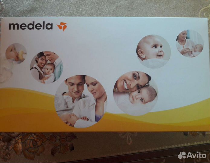 Молокоотсос medela