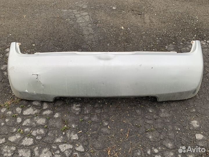 Бампер задний Nissan March K12