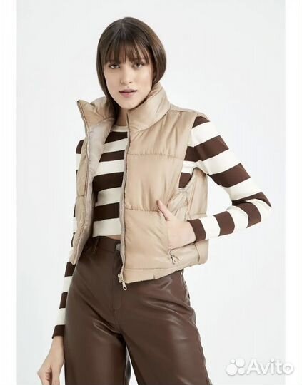 Новая женская жилетка