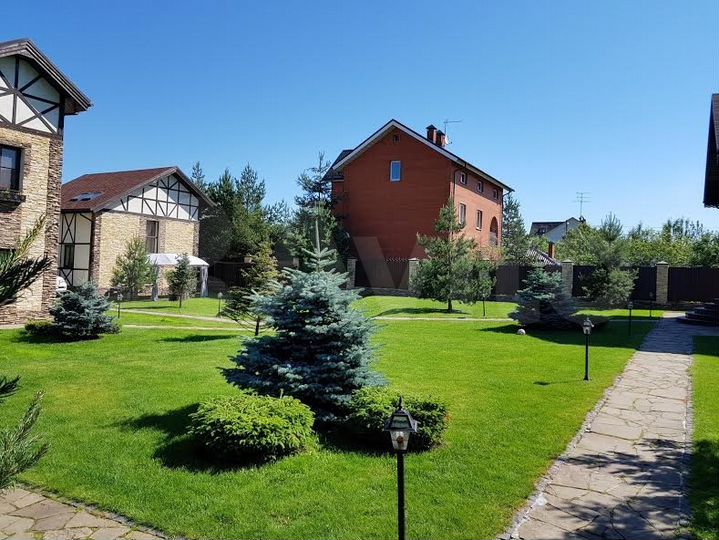 Коттедж 400 м² на участке 26 сот.