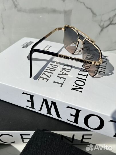 Солнцезащитные очки женские prada