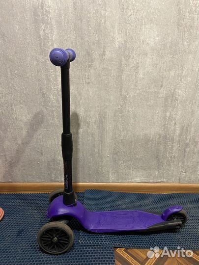 Детский трех колесный самокат