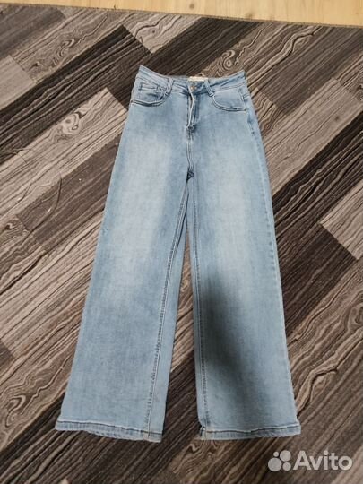 Джинсы голубые