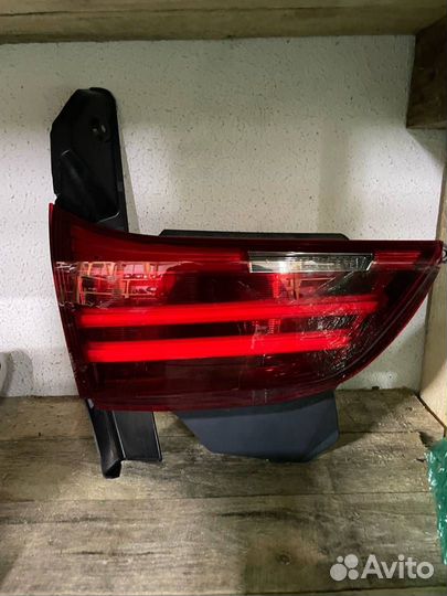 Фонарь крышки багажника левый BMW 5