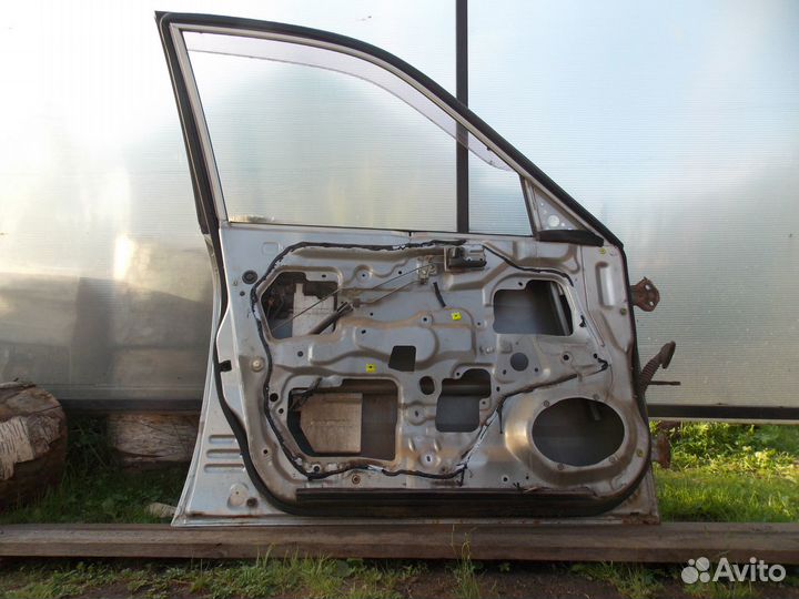 Дверь левая передняя Mazda Capella 7 GF