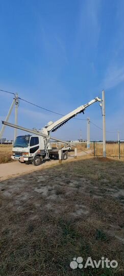 Ямобур. Установка столбов электрических, опор лэп