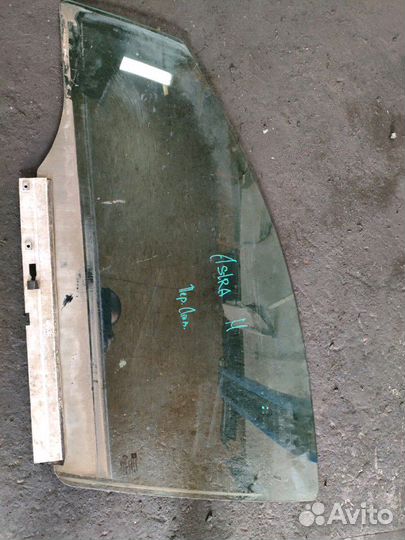 Стекло передней левой двери Opel Astra H