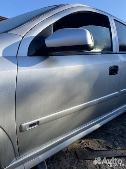 Дверь передняя левая Opel Astra G