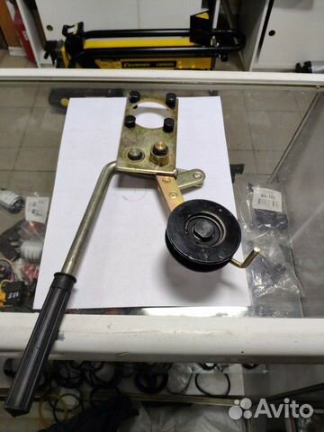 Натяжное устройство к роторной косилке заря