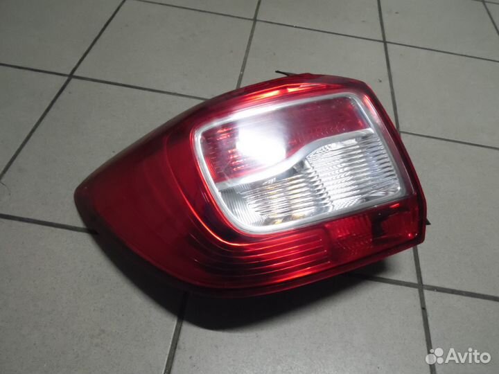 Фонарь задний левый Рено Логан 2