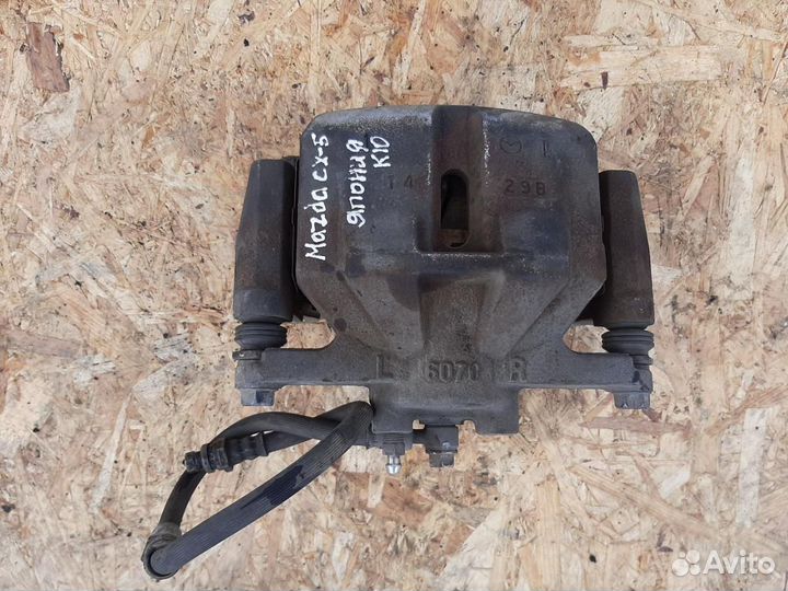 Суппорт тормозной передний правый Mazda CX-5 KE