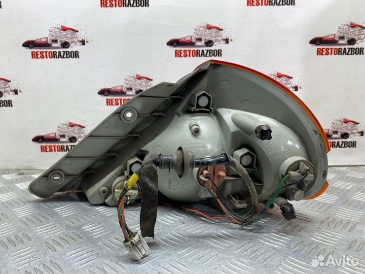 Фонарь задний задний левый Kia Spectra седан S6D