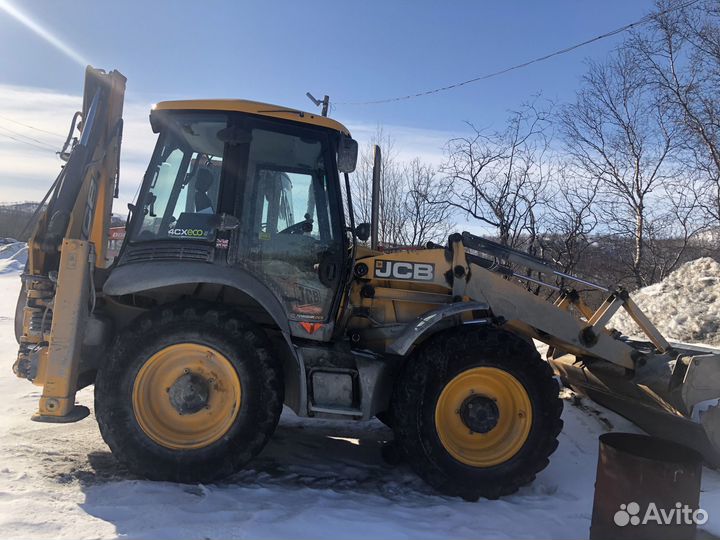 Аренда экскаватора погрузчика с гидромолотом