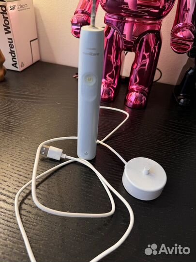 Электрическая зубная щетка philips