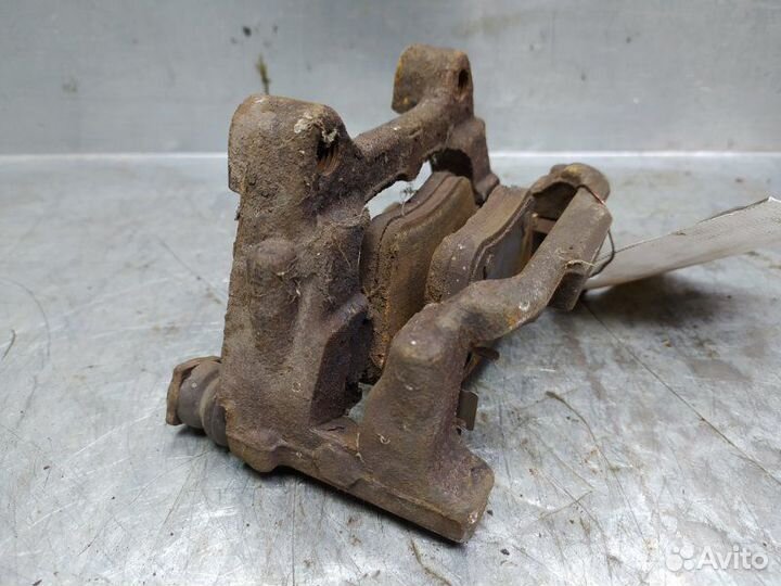 Скоба суппорта заднего левого Skoda Octavia (A5