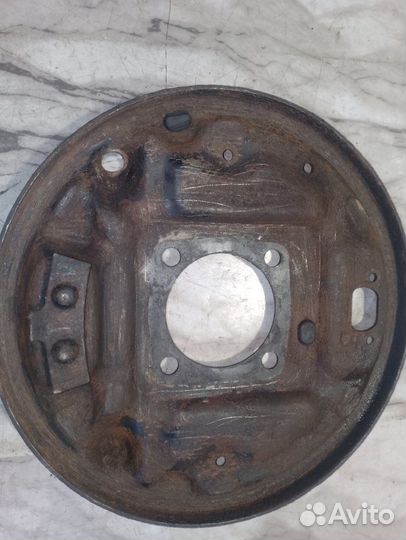 Пыльник тормозного диска задний левый Kia Sportage