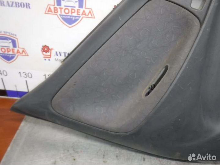 Обшивка двери задняя левая Toyota Vitz 1szfe 1999
