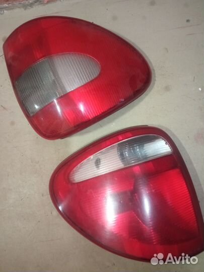 Фонарь задний Додж caravan
