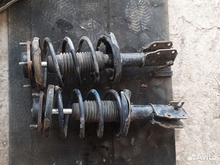 Стойки передние Mazda Premacy