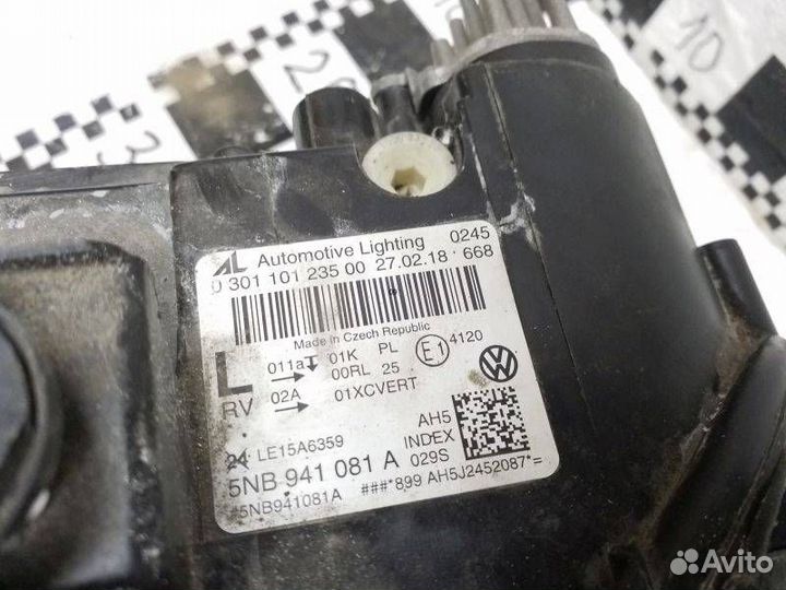 Фара левая Volkswagen Tiguan