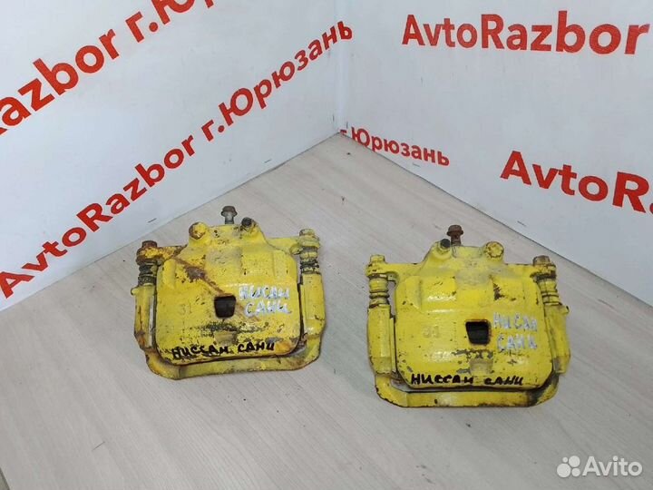 Суппорт передний Nissan Sunny N16