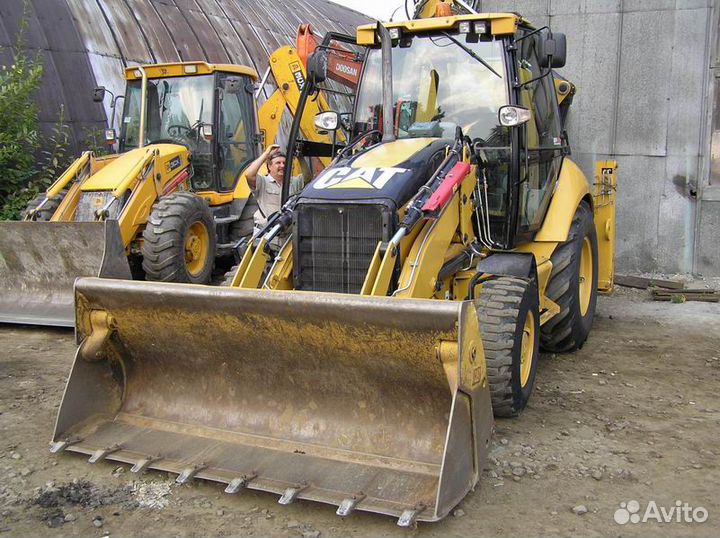 Экскаватор погрузчик caterpillar 428e