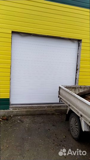 Высокие секционные ворота под ключ